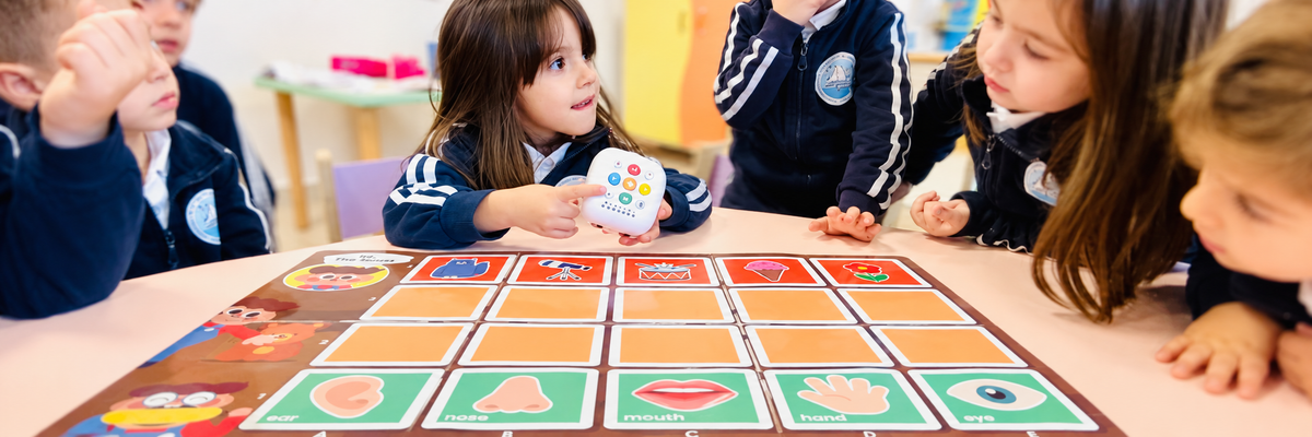 Children trying back-to-school STEM activities with a MatataStudio coding robot in a classroom